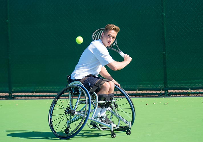 Alfie Hewett playing wheelchair tennis